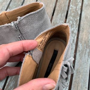 Woman’s western style suede booties